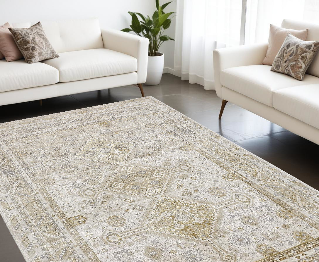 7" X 10" Gold And Ivory Floral Stain Resistant Area Rug
