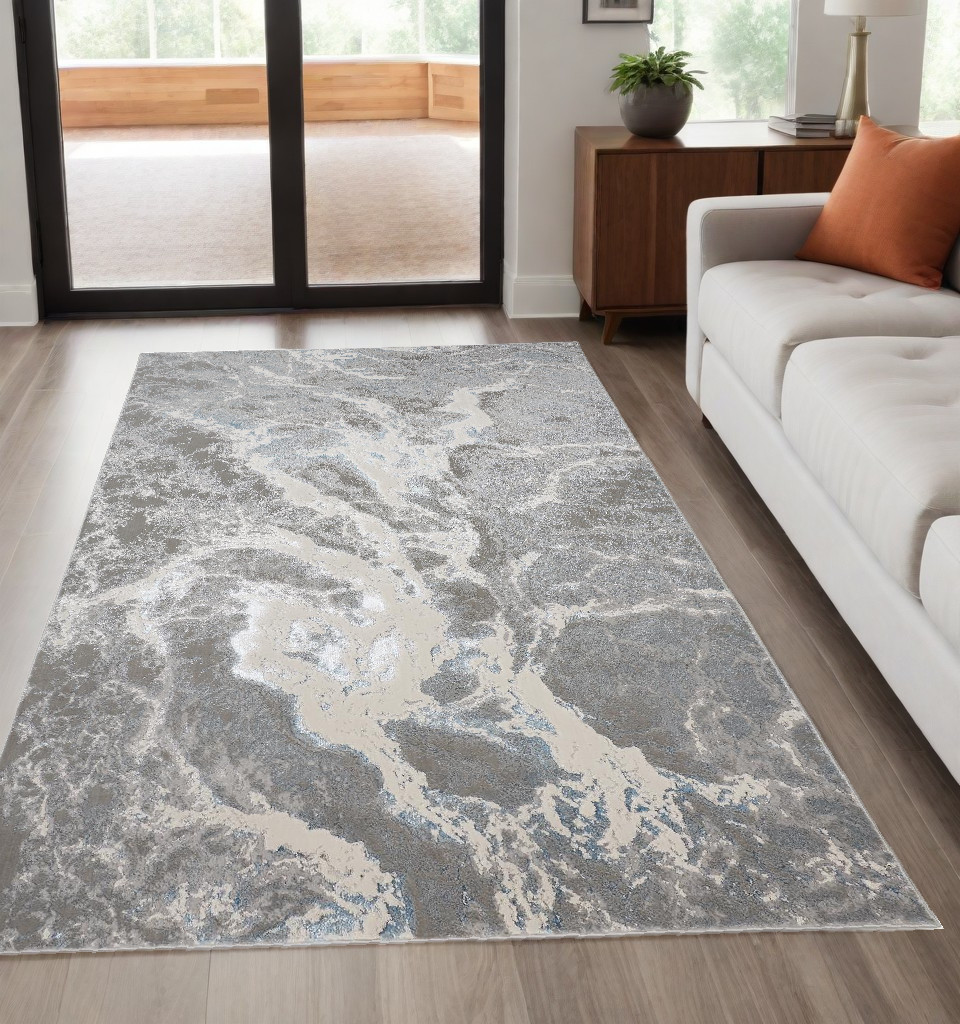 5" X 8" Gray and Ivory Abstract Power Loom Area Rug