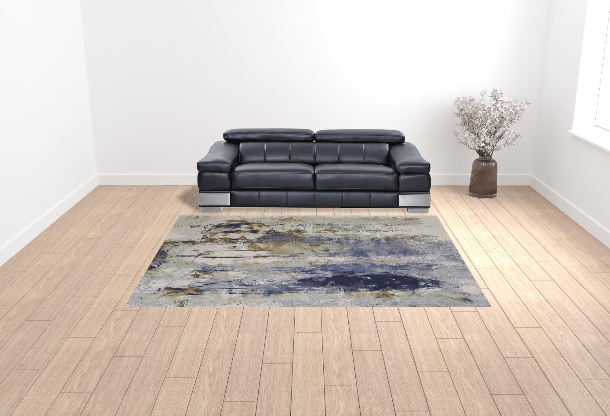 9" X 12" Blue Orange And Ivory Abstract Power Loom Area Rug