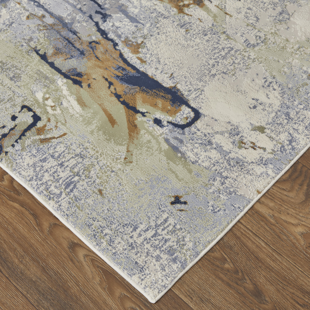 9" X 12" Blue Orange And Ivory Abstract Power Loom Area Rug