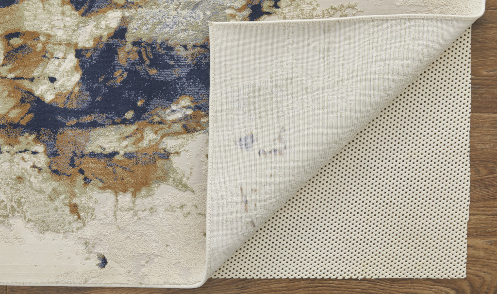 9" X 12" Blue Orange And Ivory Abstract Power Loom Area Rug
