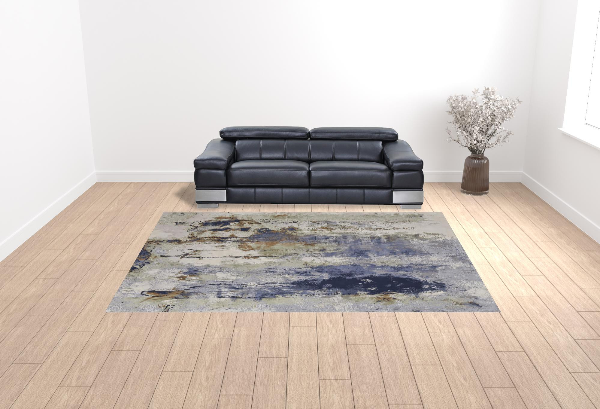 10" X 13" Blue Orange And Ivory Abstract Power Loom Area Rug