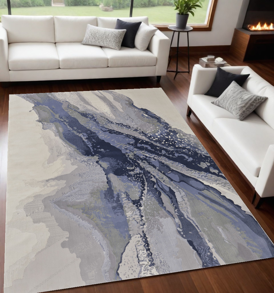 5" X 8" Gray and Ivory Abstract Power Loom Area Rug