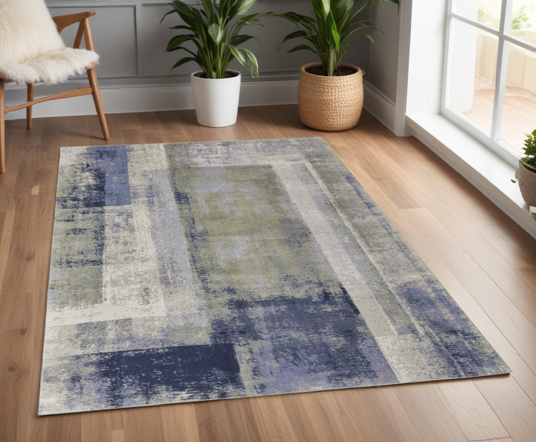4" X 6" Blue and Ivory Abstract Power Loom Distressed Area Rug