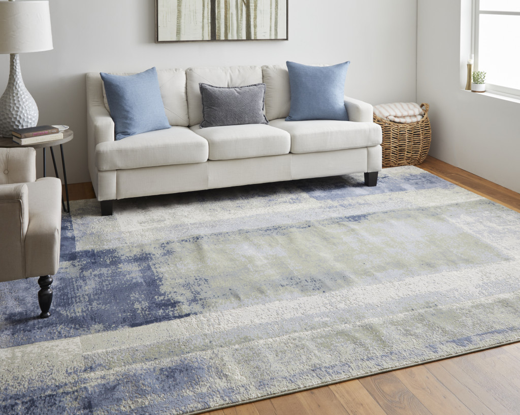 8" X 10" Blue and Ivory Abstract Power Loom Distressed Area Rug