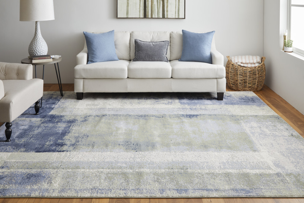 8" X 10" Blue and Ivory Abstract Power Loom Distressed Area Rug