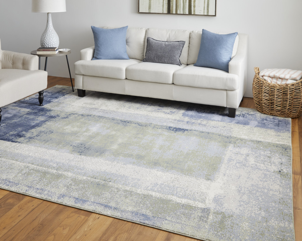 8" X 10" Blue and Ivory Abstract Power Loom Distressed Area Rug