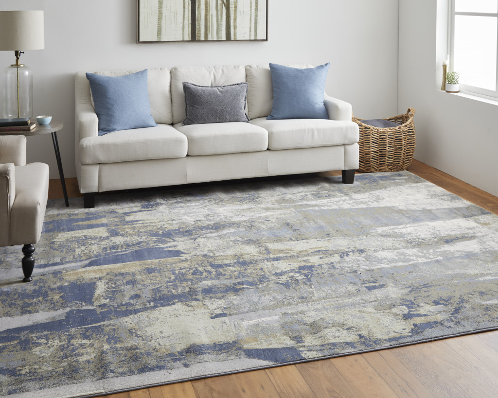 9" X 12" Blue Gray And Tan Abstract Power Loom Distressed Area Rug