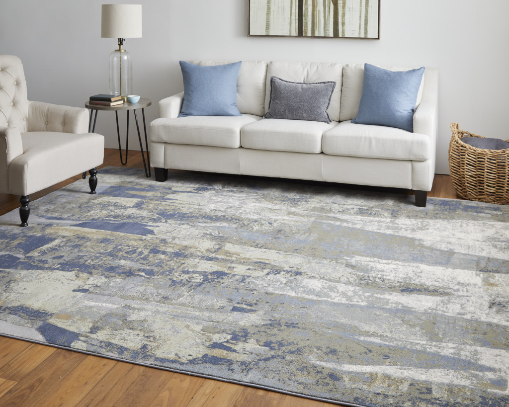 9" X 12" Blue Gray And Tan Abstract Power Loom Distressed Area Rug