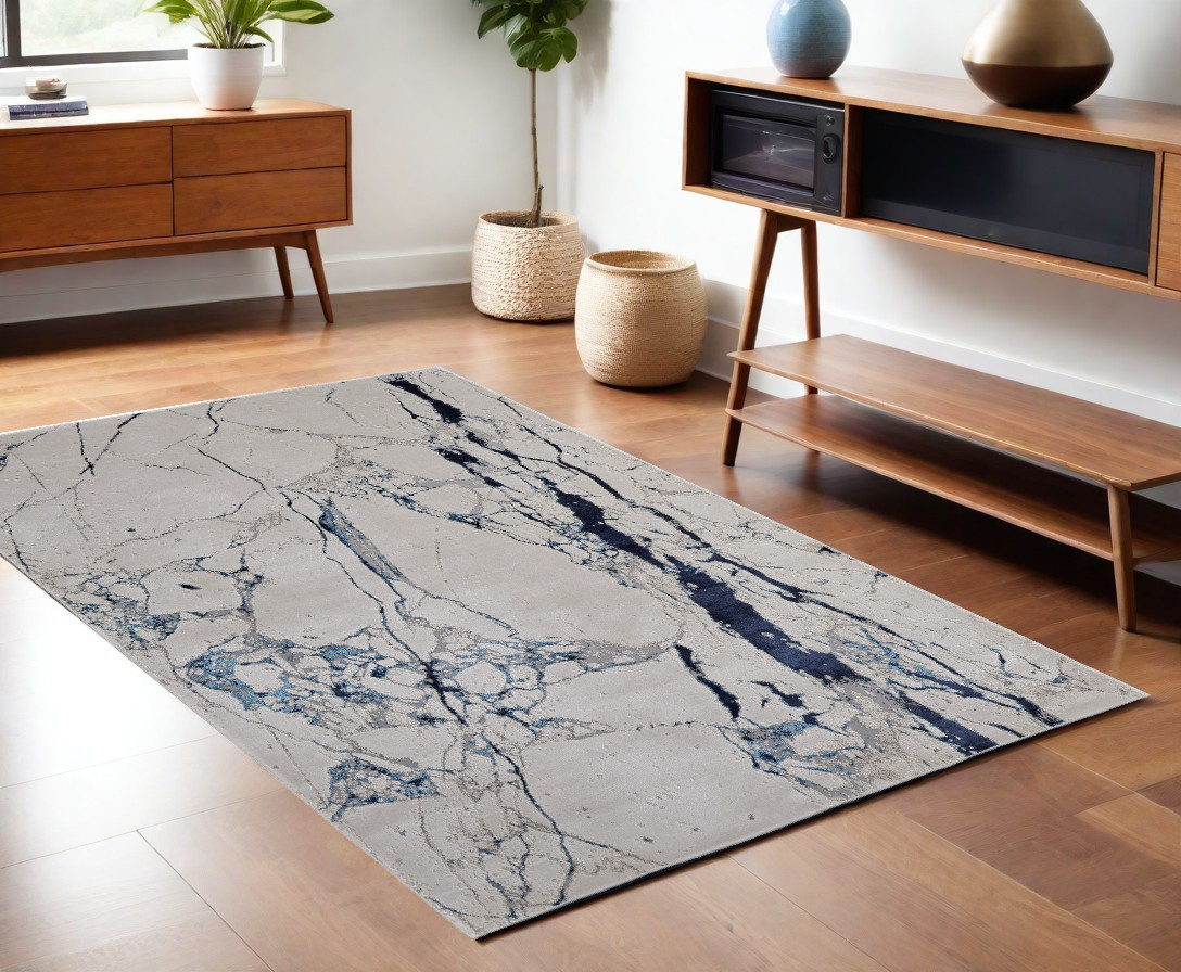 4" X 6" Ivory and Blue Marble Power Loom Distressed Area Rug