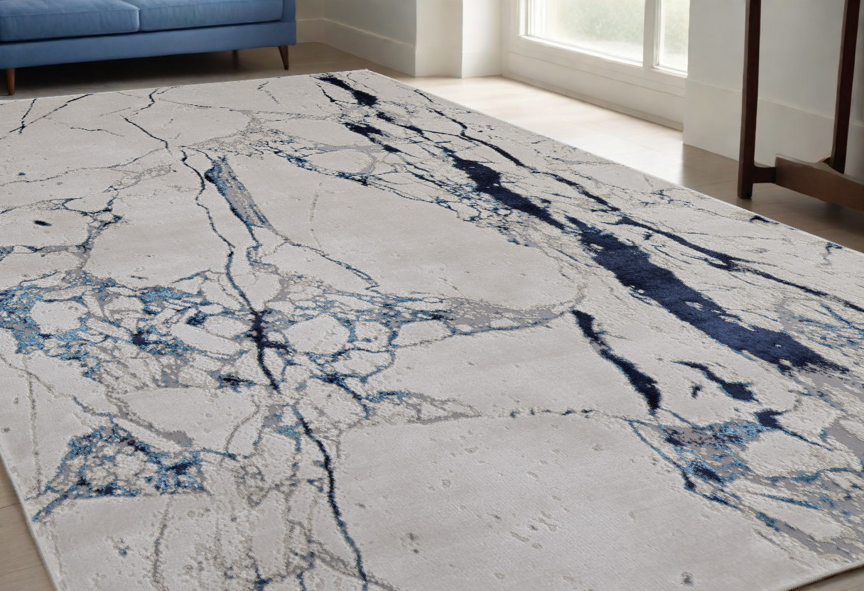 5" X 8" Ivory and Blue Marble Power Loom Distressed Area Rug
