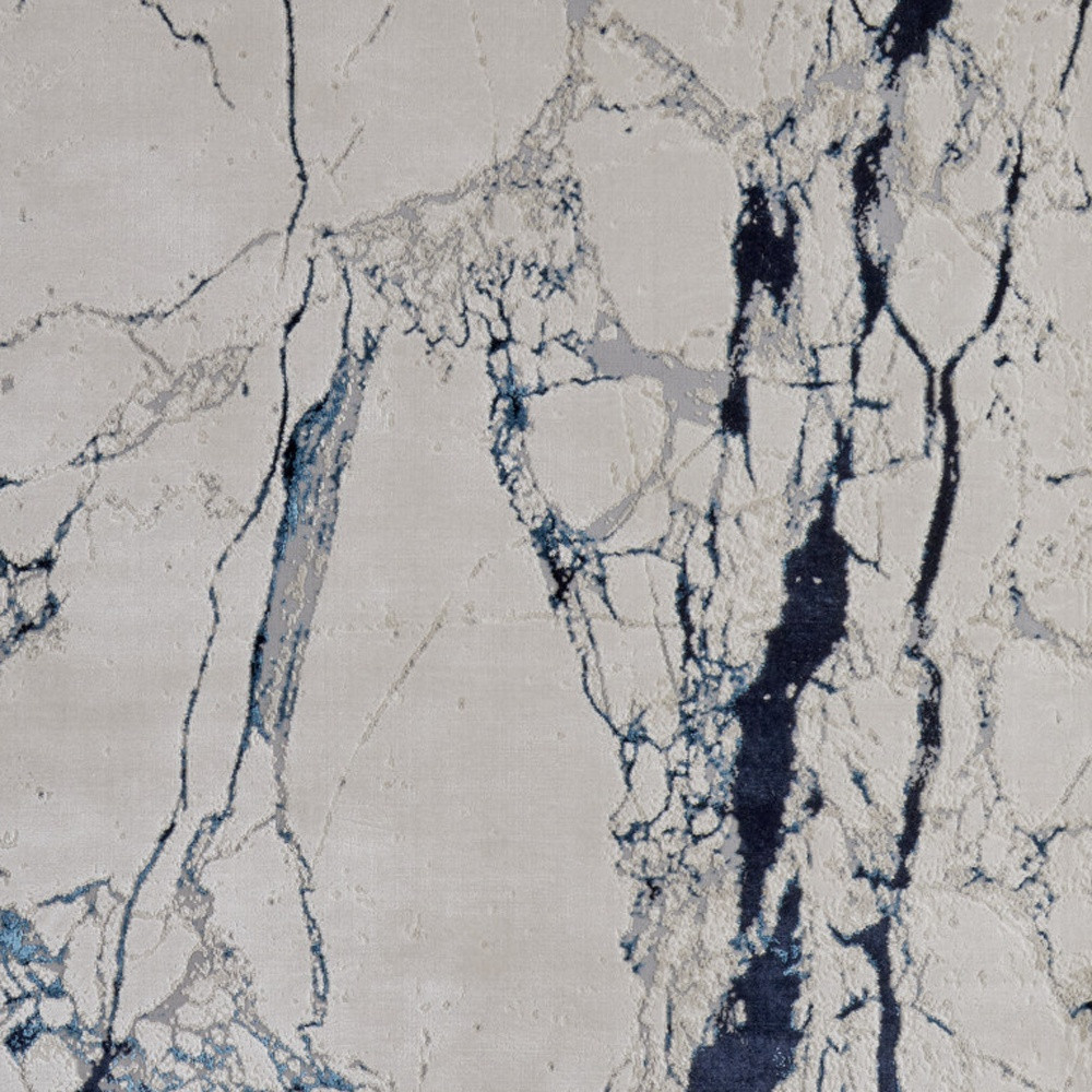7" X 10" Ivory and Blue Marble Power Loom Distressed Area Rug