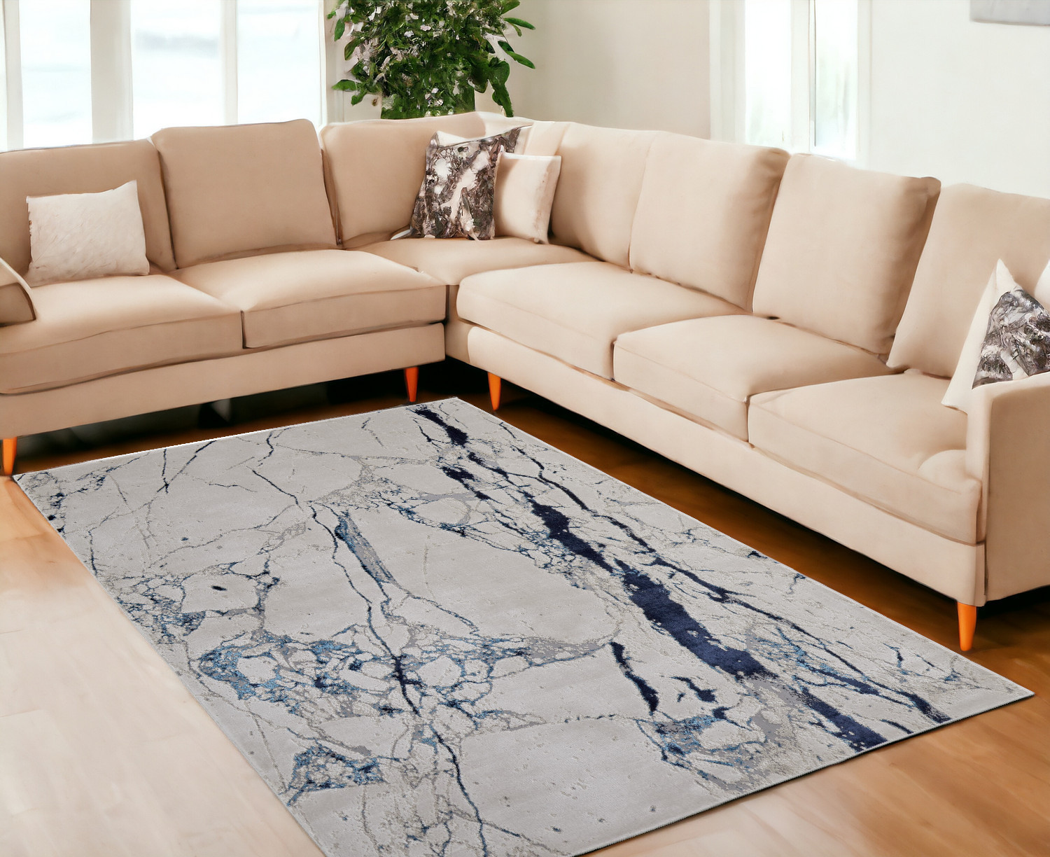 9" X 12" Ivory and Blue Marble Power Loom Distressed Area Rug