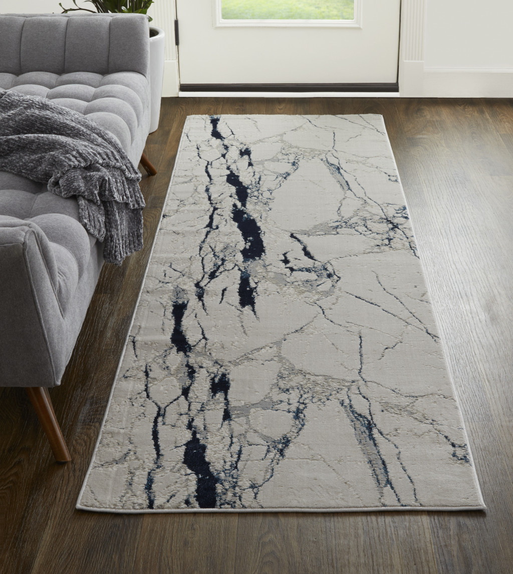 8" Ivory Blue And Black Abstract Power Loom Distressed Runner Rug