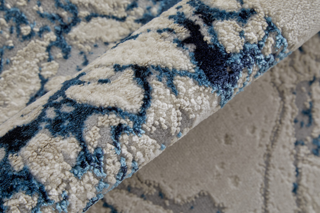 8" Ivory Blue And Black Abstract Power Loom Distressed Runner Rug