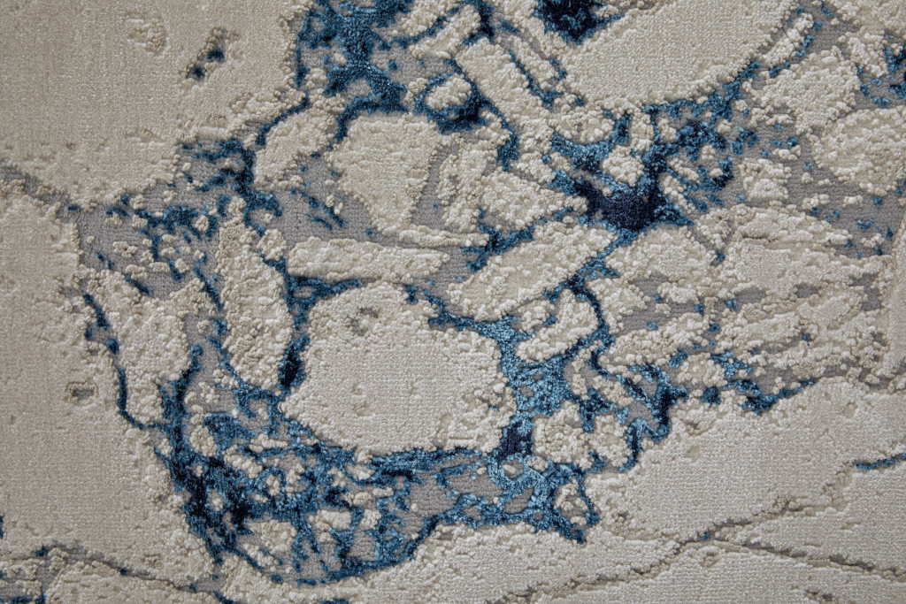 8" Ivory Blue And Black Abstract Power Loom Distressed Runner Rug