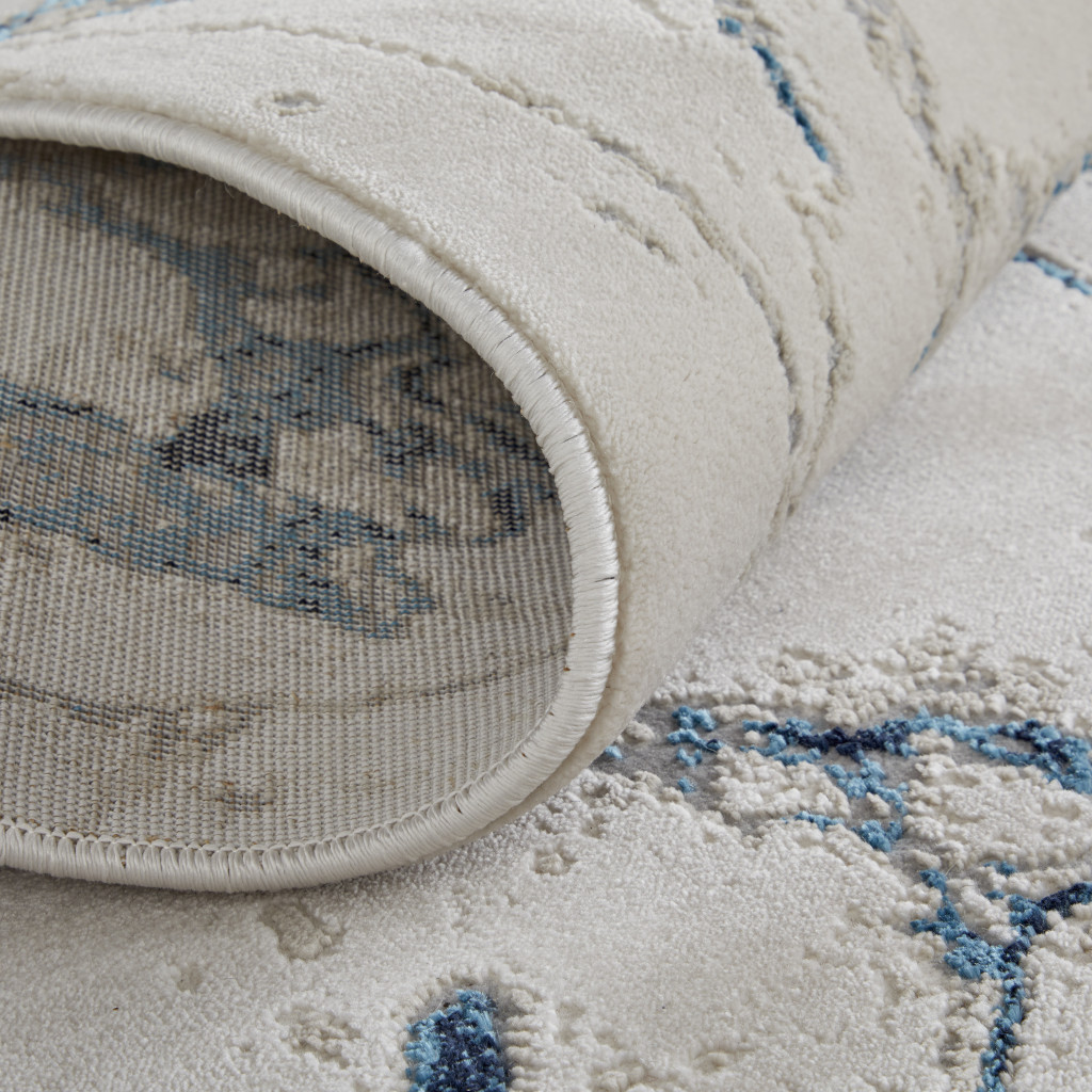 8" Ivory Blue And Black Abstract Power Loom Distressed Runner Rug