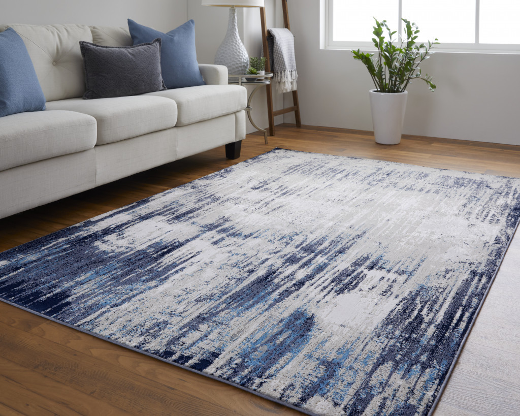 4" X 6" Tan Blue And Ivory Abstract Power Loom Distressed Area Rug