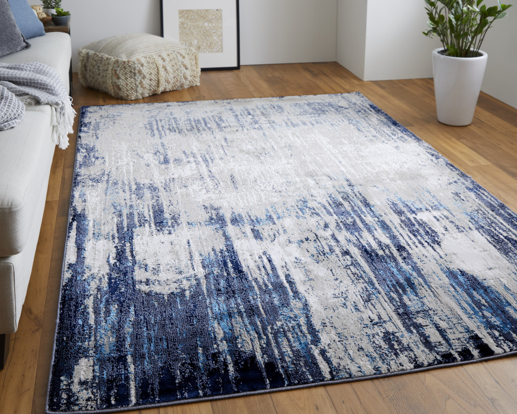 4" X 6" Tan Blue And Ivory Abstract Power Loom Distressed Area Rug