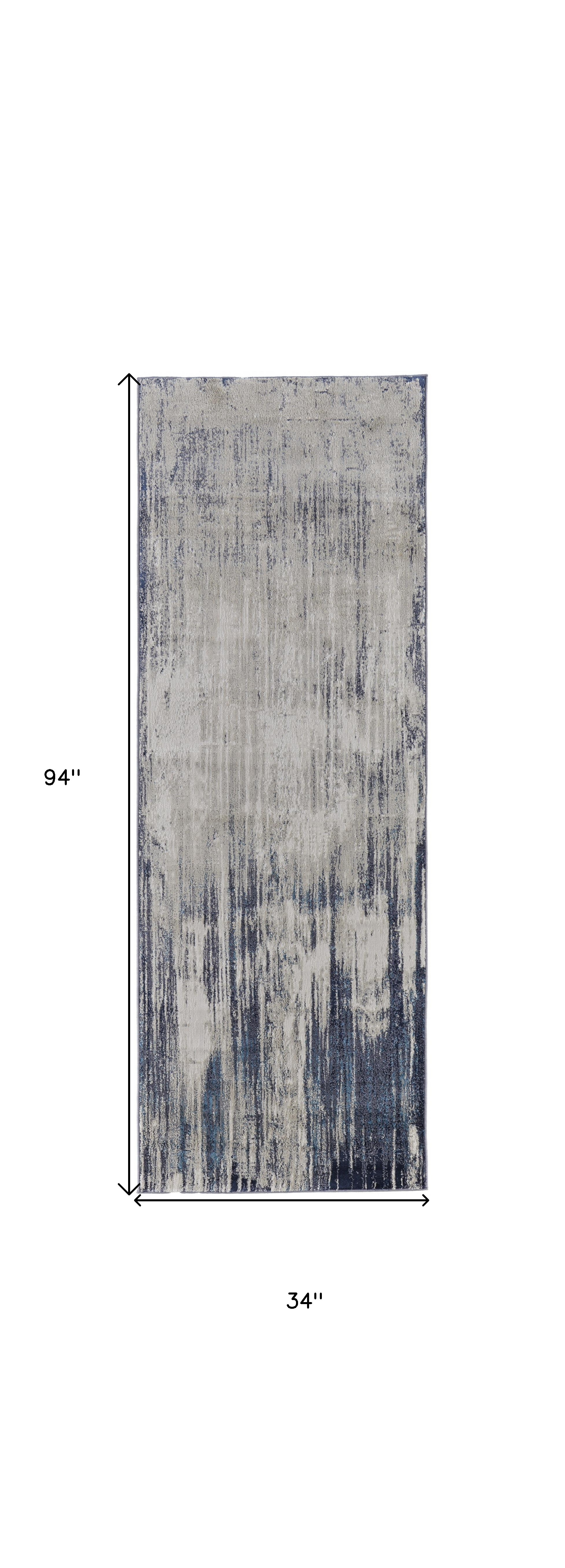 8" Tan Blue And Ivory Abstract Power Loom Distressed Runner Rug