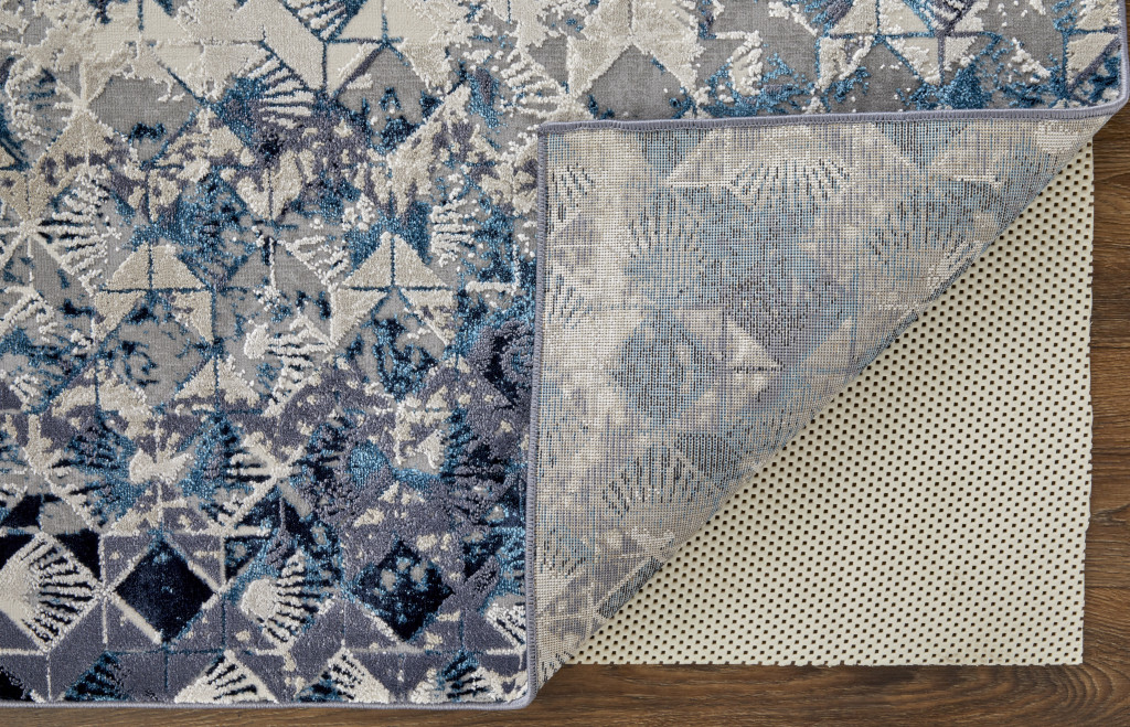 7" X 10" Blue and Ivory Geometric Power Loom Distressed Non Skid Area Rug