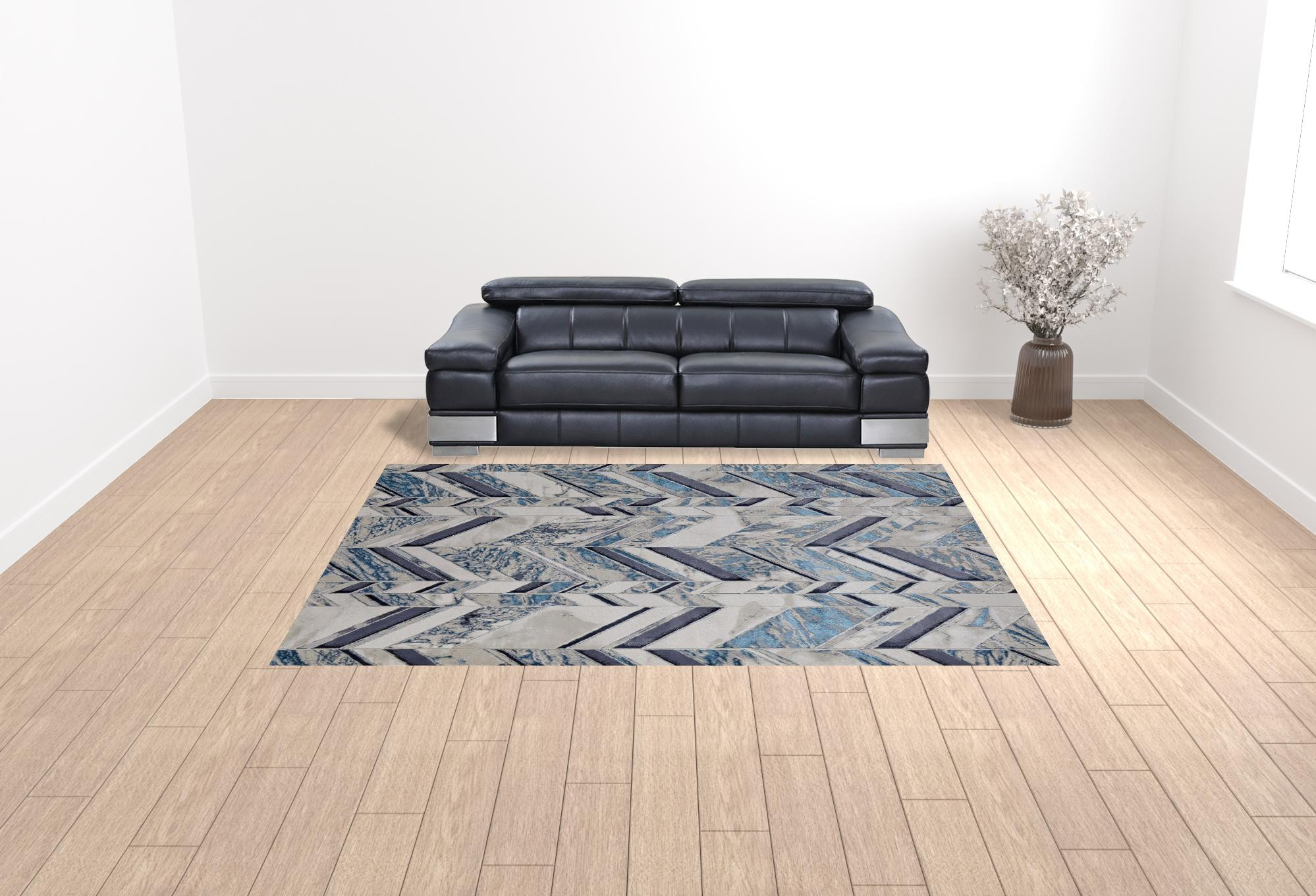 9" X 12" Ivory Blue And Gray Chevron Power Loom Distressed Area Rug
