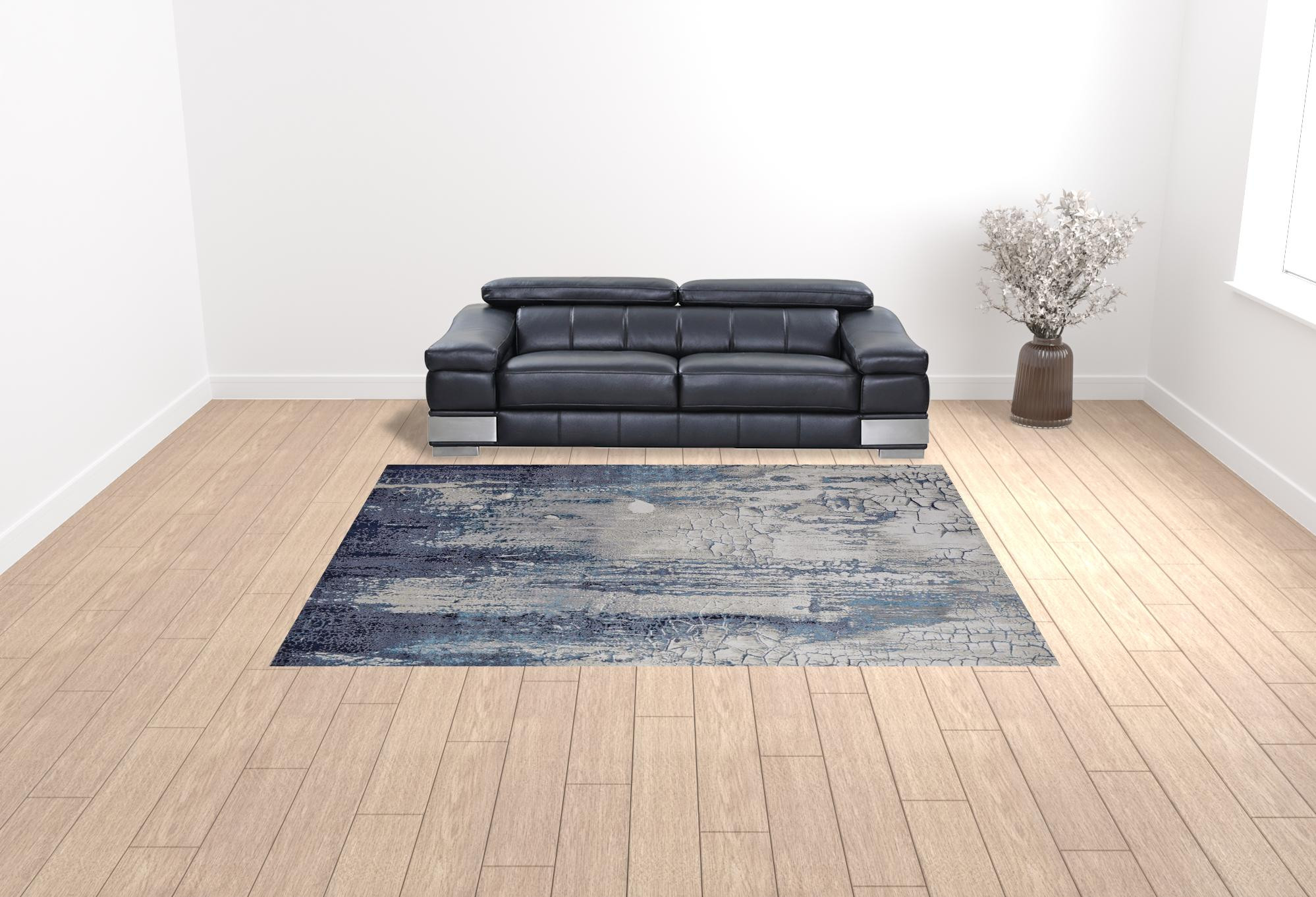 9" X 12" Ivory Blue And Black Abstract Power Loom Distressed Area Rug