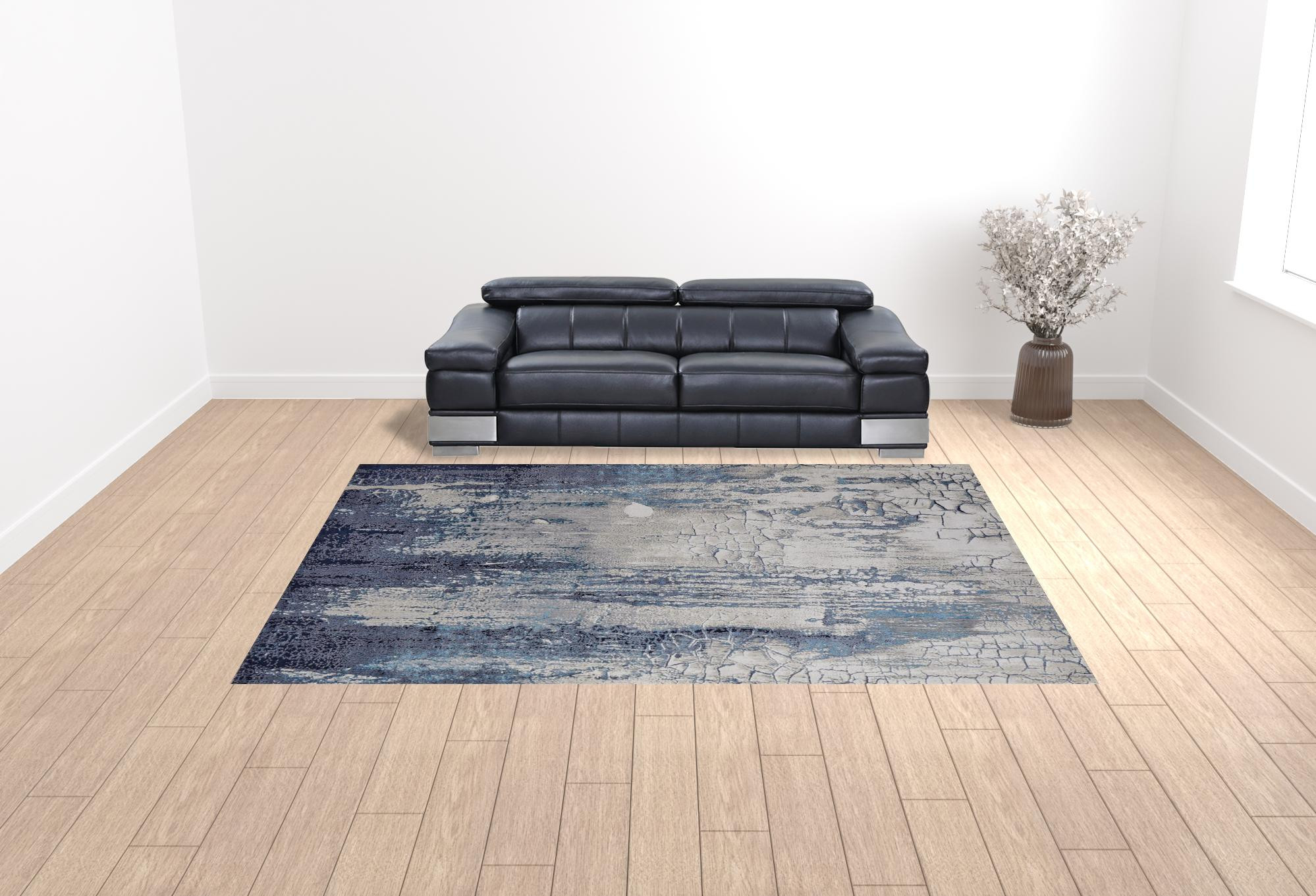 10" X 13" Ivory Blue And Black Abstract Power Loom Distressed Area Rug
