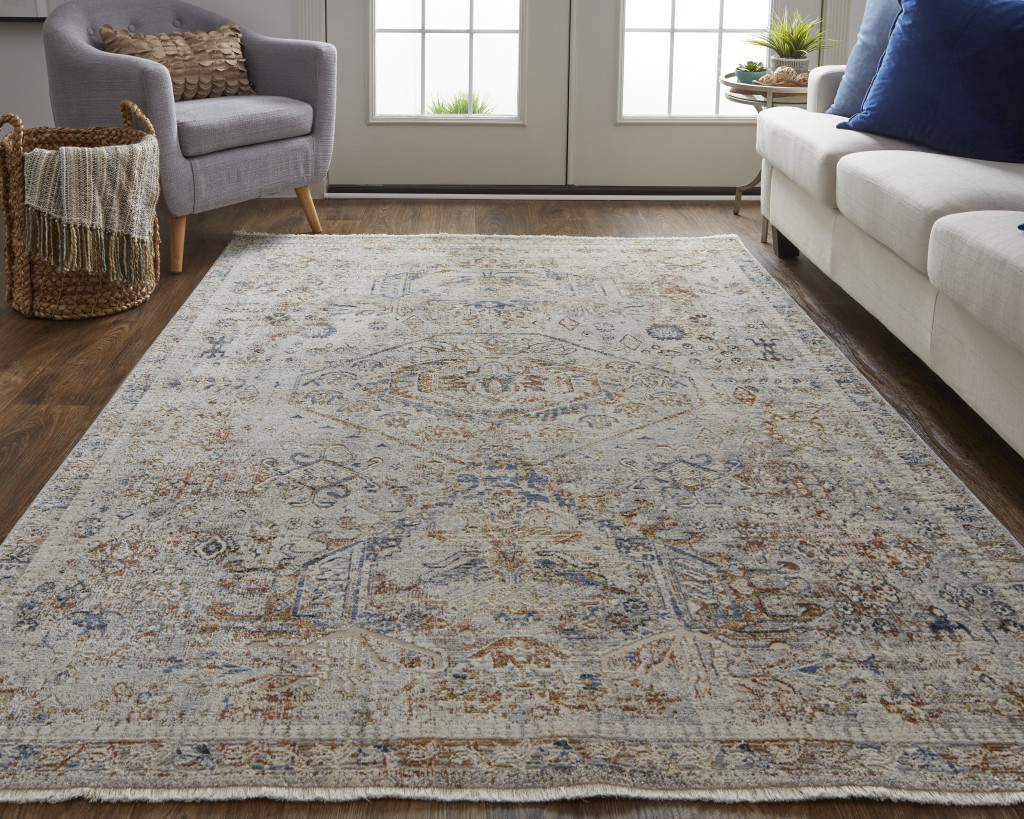 2" X 3" Tan Orange And Red Floral Power Loom Distressed Area Rug With Fringe