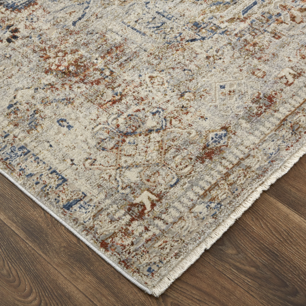 2" X 3" Tan Orange And Red Floral Power Loom Distressed Area Rug With Fringe