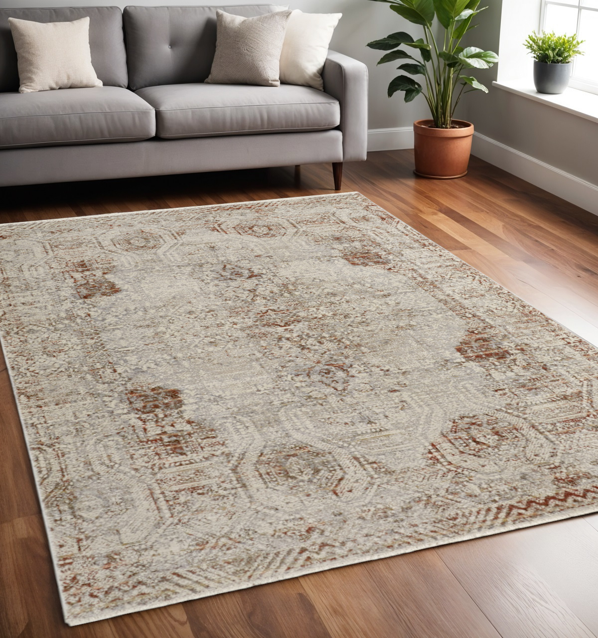 5" X 8" Tan and Ivory Floral Power Loom Distressed Non Skid Area Rug With Fringe