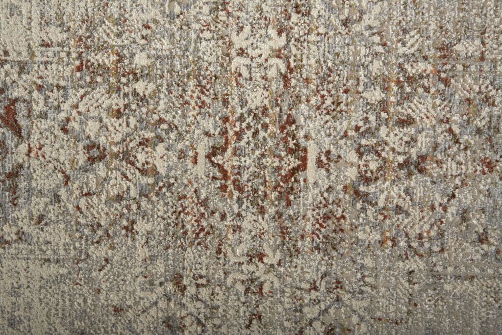 10" X 13" Tan Ivory And Orange Floral Power Loom Distressed Area Rug With Fringe