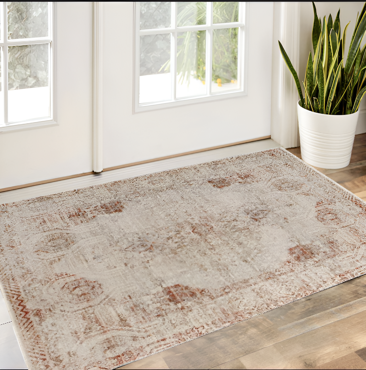 2" X 3" Tan Ivory And Orange Floral Power Loom Distressed Area Rug With Fringe