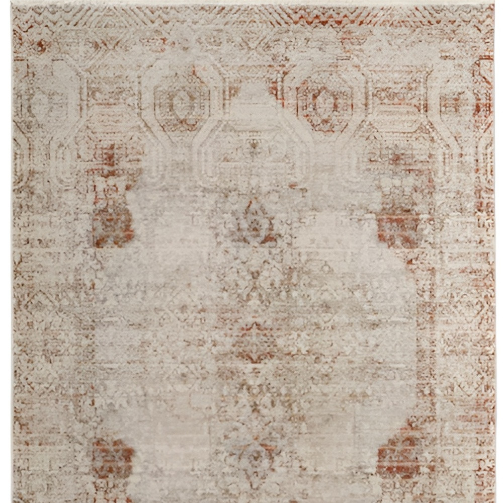 2" X 3" Tan Ivory And Orange Floral Power Loom Distressed Area Rug With Fringe