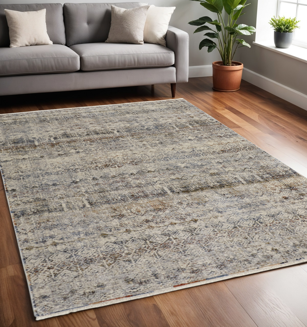 5" X 8" Tan and Ivory Geometric Power Loom Distressed Non Skid Area Rug With Fringe
