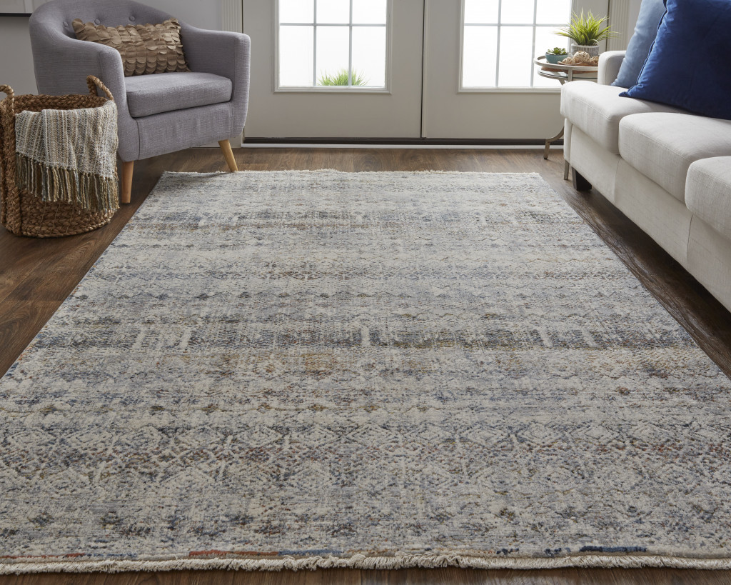5" X 8" Tan and Ivory Geometric Power Loom Distressed Non Skid Area Rug With Fringe