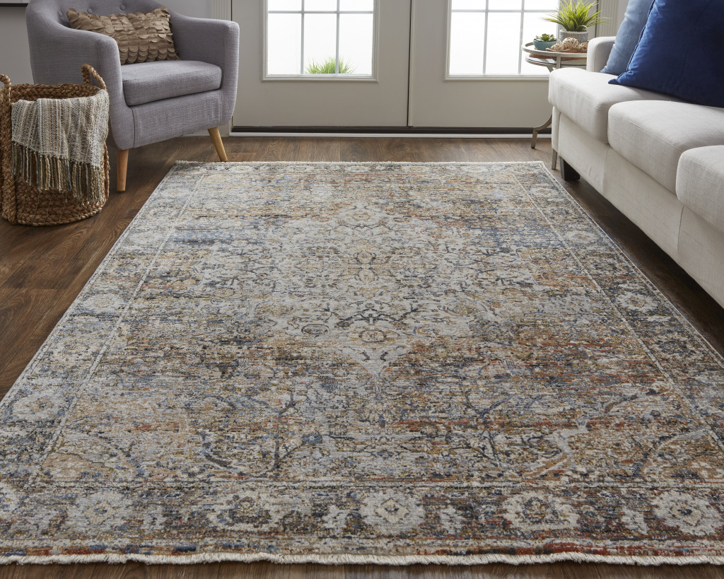 2" X 3" Tan Orange And Blue Floral Power Loom Distressed Area Rug With Fringe