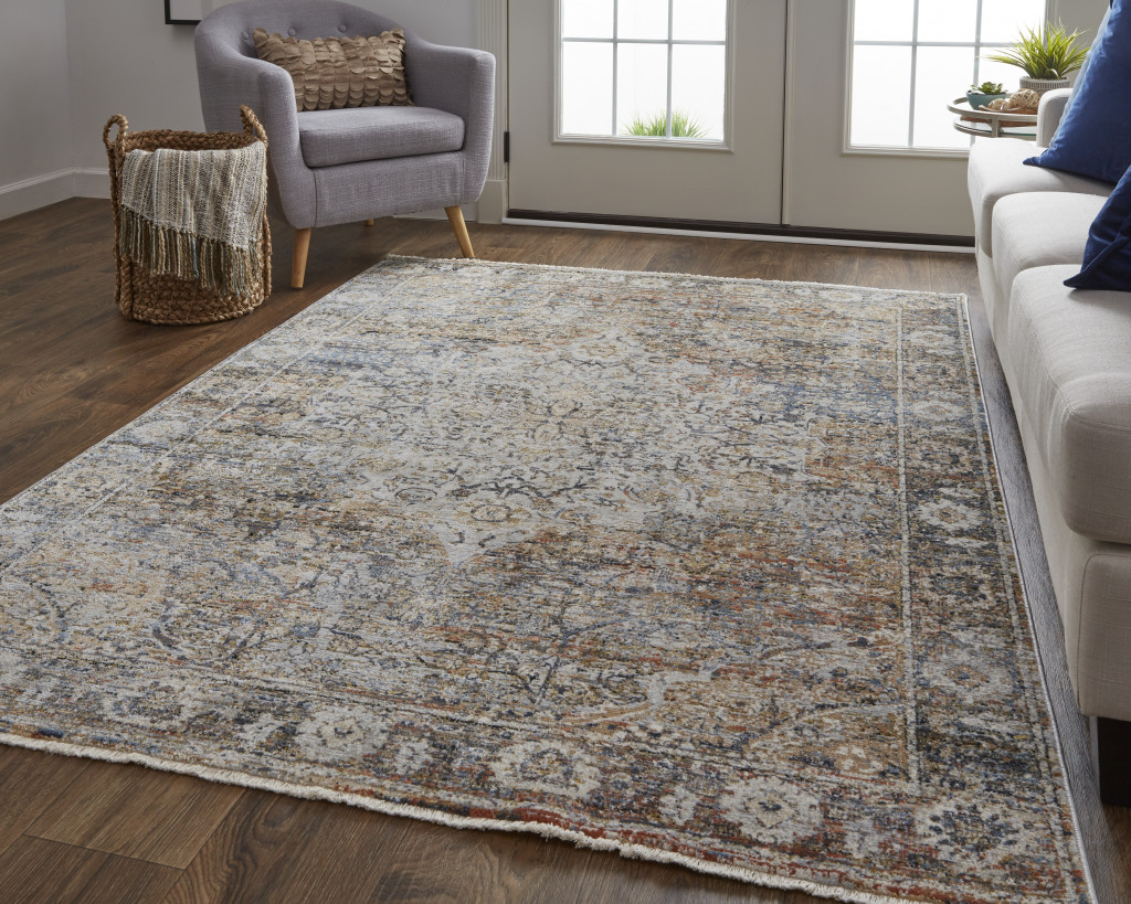 2" X 3" Tan Orange And Blue Floral Power Loom Distressed Area Rug With Fringe