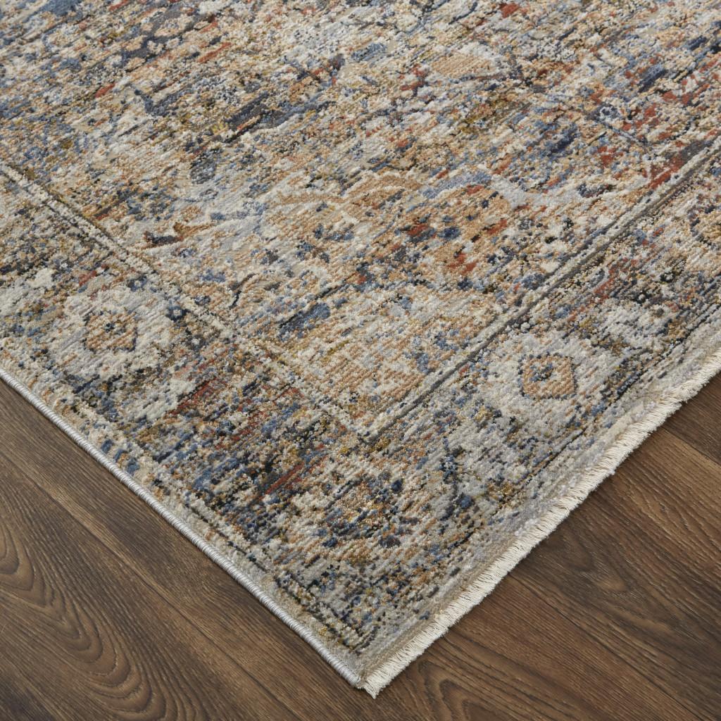 2" X 3" Tan Orange And Blue Floral Power Loom Distressed Area Rug With Fringe