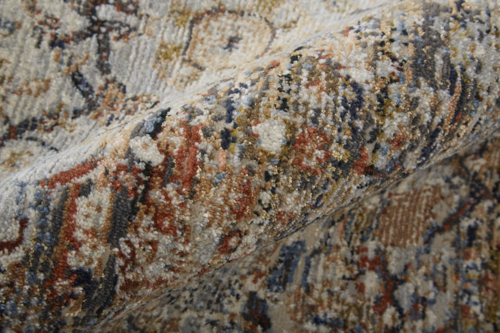 2" X 3" Tan Orange And Blue Floral Power Loom Distressed Area Rug With Fringe
