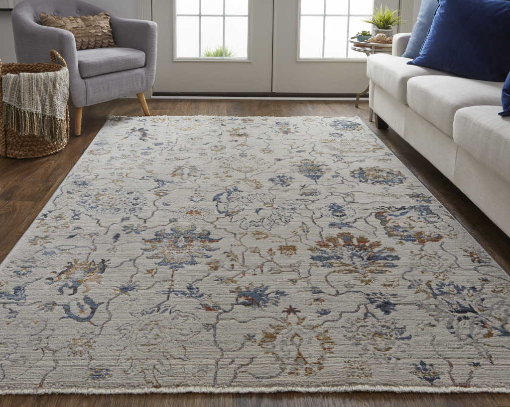 8" X 10" Ivory and Blue Floral Power Loom Distressed Non Skid Area Rug With Fringe
