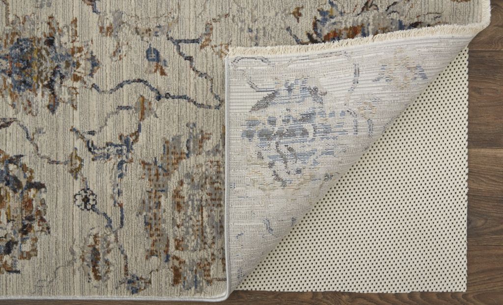 10" X 13" Ivory Orange And Blue Floral Power Loom Distressed Area Rug With Fringe