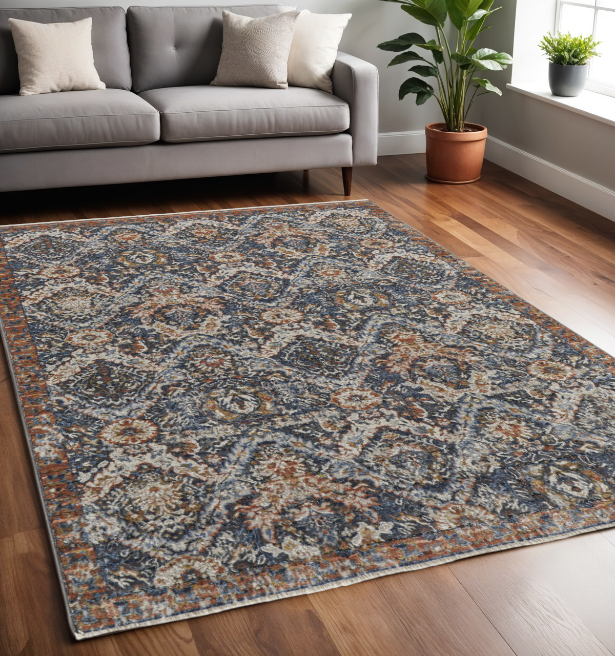 5" X 8" Blue and Orange Floral Power Loom Non Skid Area Rug With Fringe