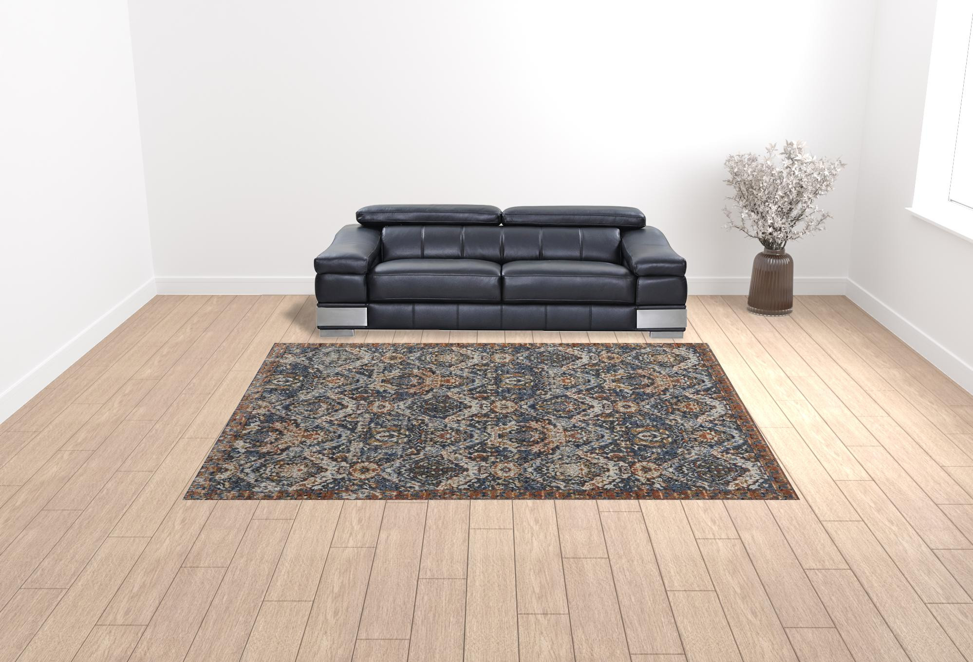 10" X 13" Blue Orange And Ivory Floral Power Loom Area Rug With Fringe