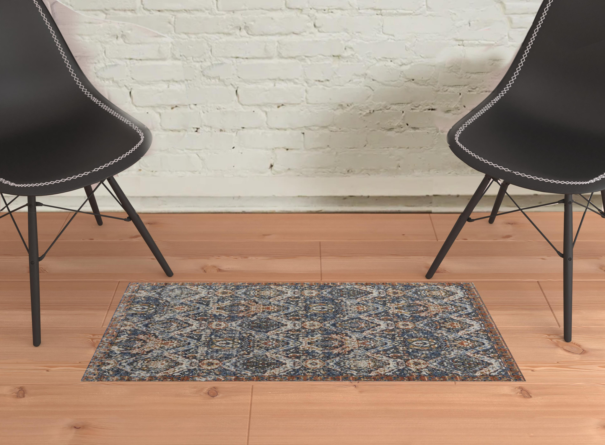 2" X 3" Blue Orange And Ivory Floral Power Loom Area Rug With Fringe