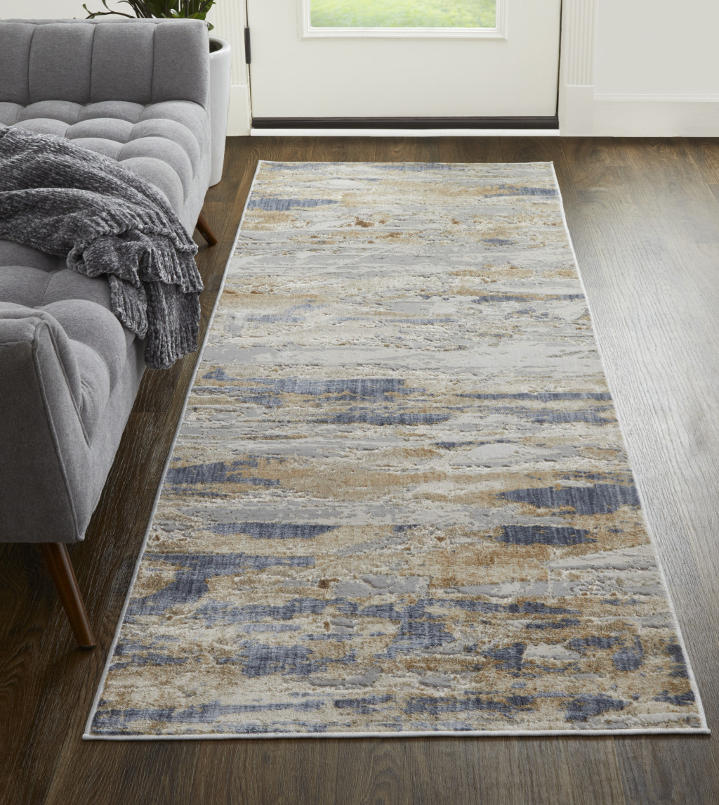 12" Tan Orange And Ivory Abstract Power Loom Distressed Runner Rug