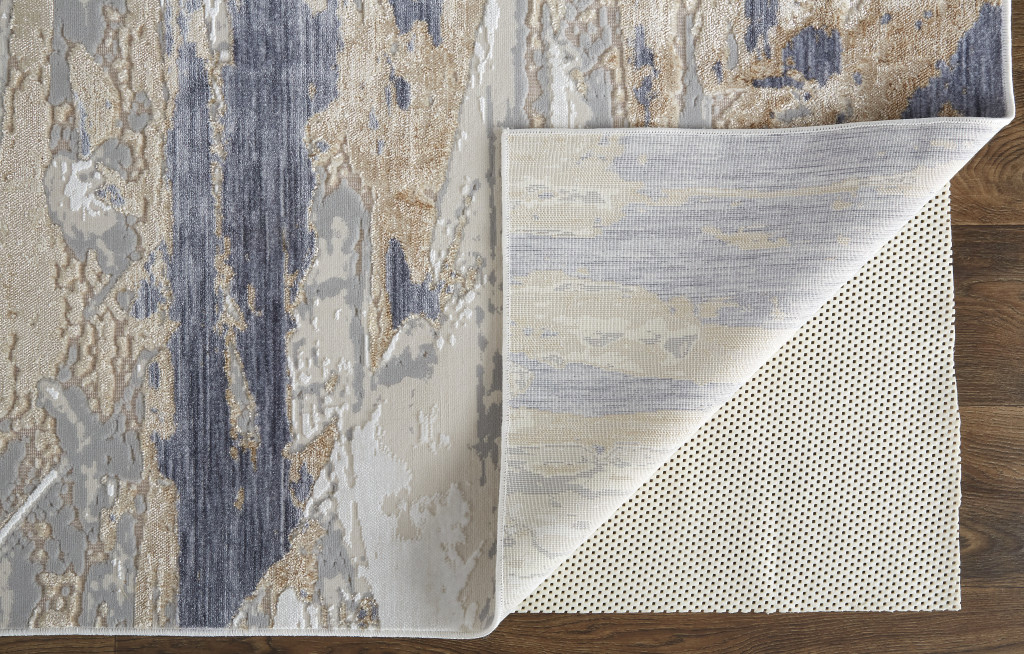 2" X 3" Tan Orange And Ivory Abstract Power Loom Distressed Area Rug