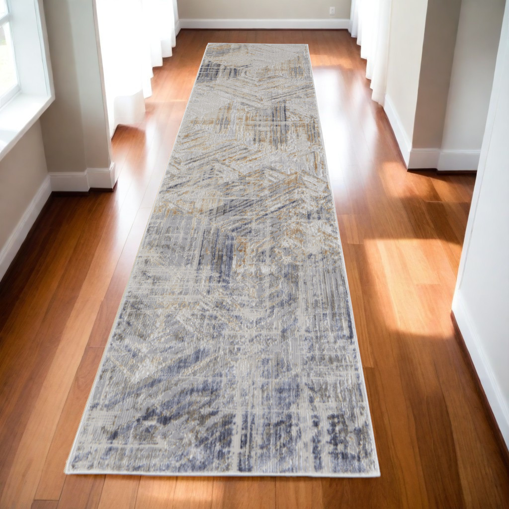 10" Tan and Ivory Abstract Power Loom Distressed Non Skid Runner Rug