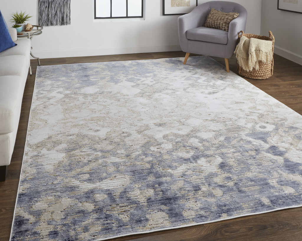 4" X 6" Tan Ivory And Blue Abstract Power Loom Distressed Area Rug