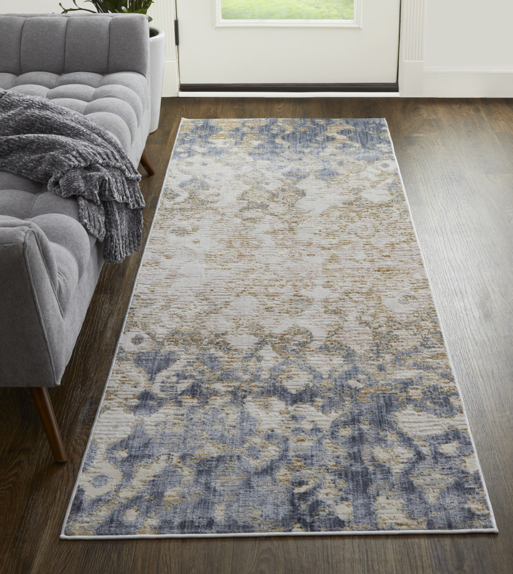 12" Tan Ivory And Blue Abstract Power Loom Distressed Runner Rug
